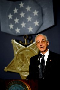 US Navy 071023-N-2653P-243 Deputy Secretary of Defense, the Honorable Gordon England delivers his remarks during a ceremony recognizing the actions of Navy SEAL Lt. Michael Murphy held at the Hall of Heroes inside the Pentagon