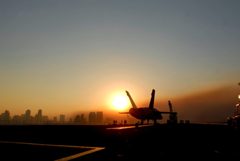 US Navy 071023-N-4776G-013 The sun rises through the smoke from the Harris Wildfires as seen from on board USS Ronald Reagan (CVN 76)