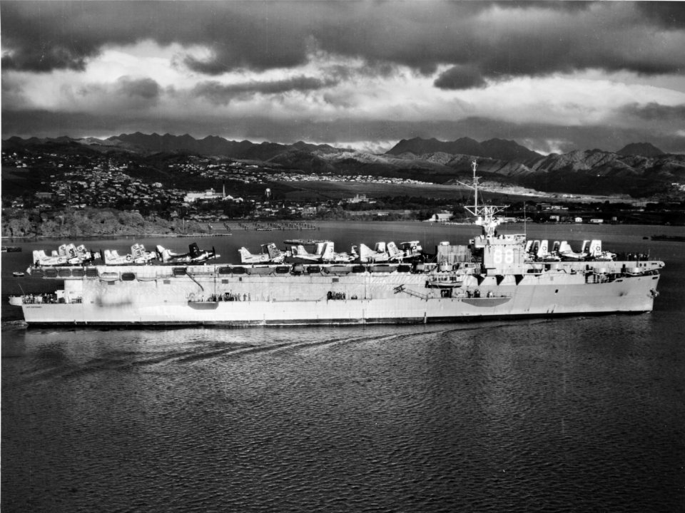 USS Cape Esperance (T-CVU-88) at Pearl Harbor in the 1950s