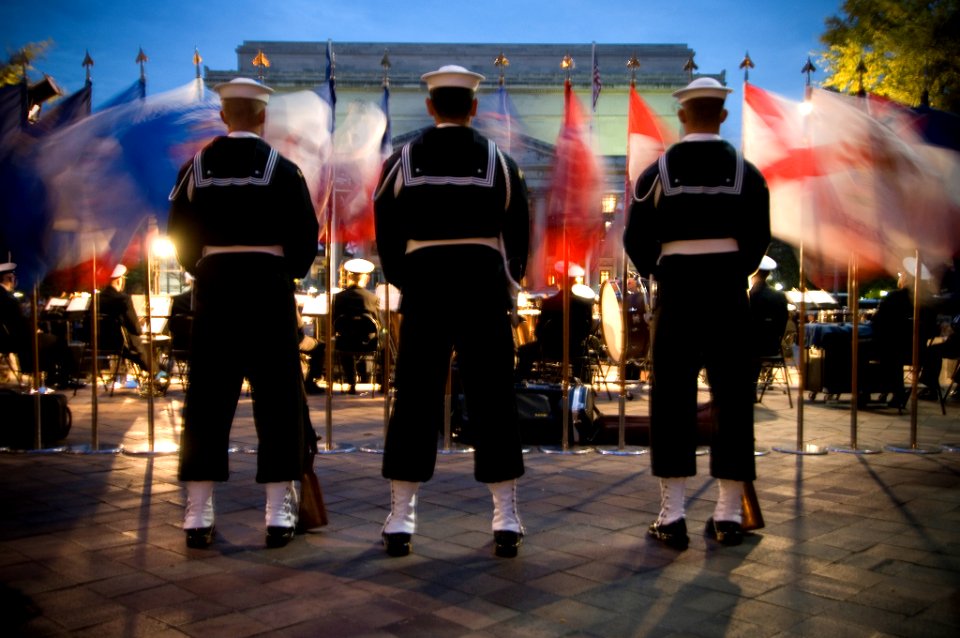US Navy 071023-N-5319A-035 Members of the Navy Ceremonial Guard stand behind the United States Navy Ceremonial Band during a Medal of Honor Flag ceremony recognizing the actions of Navy SEAL Lt. Michael Murphy held at the Unite
