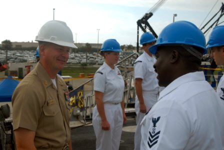 US Navy 071030-N-0486G-001 Fleet Master Chief (FLTCM) Rick West, of Commander, U.S. Fleet Forces Command, speaks with Boatswain's Mate 1st Class Billy J. Helms during a visit to guided-missile destroyer USS Roosevelt (DDG 80)