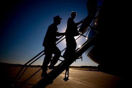 US Navy 071024-N-0696M-343 Chairman of the Joint Chiefs of Staff, U.S. Navy Adm. Mike Mullen and his wife Deborah board an Air Force C-40 aircraft at Manhattan regional airport at the conclusion of a two-day tour of Army bases photo