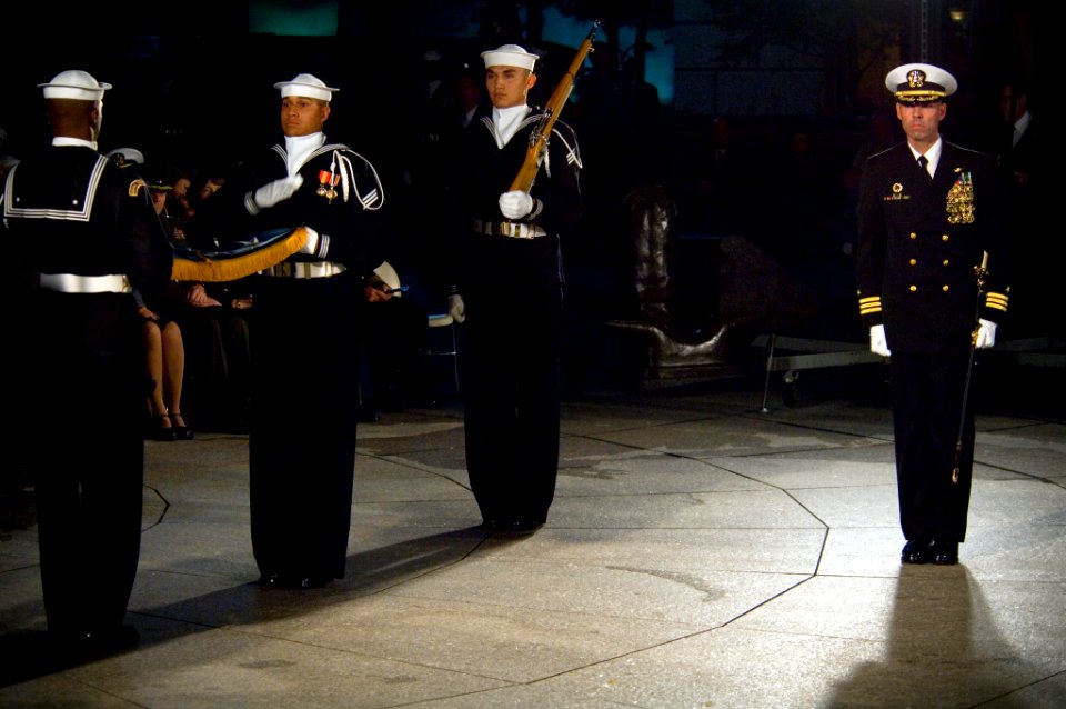 US Navy 071023-N-5319A-023 Members of the Navy Ceremonial Guard fold the Medal of Honor Flag to be presented to Daniel and Maureen Murphy, the parents of Navy SEAL Lt. Michael Murphy, during the special ceremony in honor of the