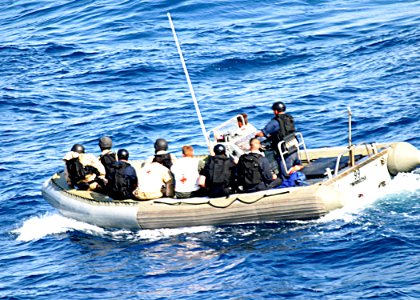 US Navy 071030-N-0000X-047 Boarding team members from guided-missile destroyer USS James E. Williams (DDG 95) head toward North Korean cargo vessel Dai Hong Dan to provide medical assistance