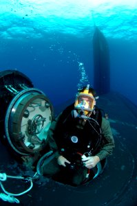 US Navy 071026-N-3093M-046 A Navy diver from Naval Special Warfare Logistics Support conducts Lock Out Training with the nuclear-powered fast-attack submarine USS Hawaii (SSN 776) for material certification