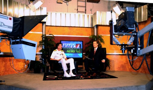 US Navy 090623-N-6220J-007 Rear Adm. Michael J. Browne, deputy chief engineer of Naval Sea Systems Command, is interviewed by KWQC-TV news anchor David Nelson during Quad Cities Navy Week