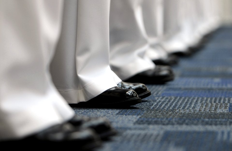 US Navy 090626-N-5328N-018 Center for Information Dominance (CID) Corry Station Sailors man the rails of the second deck at the National Museum of Naval Aviation at Naval Air Station Pensacola during a change of command ceremon