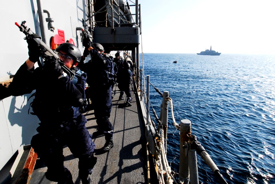 US Navy 090625-N-7092S-159 Chilean sailors assigned to the Chilean Navy frigate CNS Lynch (FF 07) conduct a maritime interdiction operation Sailors aboard the guided-missile frigate USS Kauffman (FFG 59)
