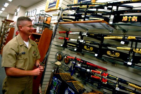 US Navy 090629-N-9818V-501 Master Chief Petty Officer of the Navy (MCPON) Rick West makes a stop to visit the Navy Exchange at U.S. Fleet Activities Sasebo during his visit to the base