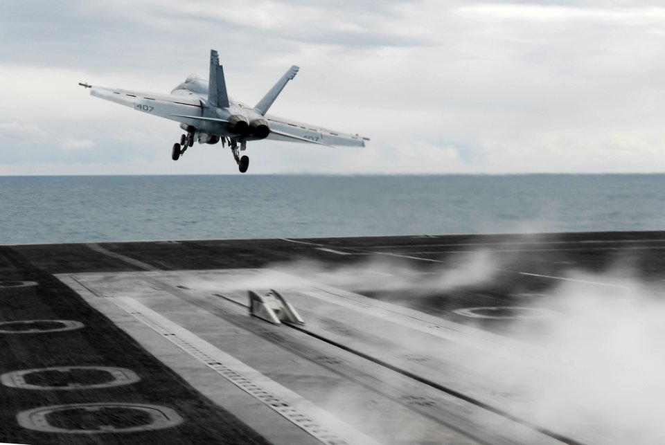 US Navy 090626-N-0684R-035 An F-A-18E Super Hornet from the Argonauts of Strike Fighter Squadron (VFA) 147 launches from the aircraft carrier USS John C. Stennis (CVN 74)