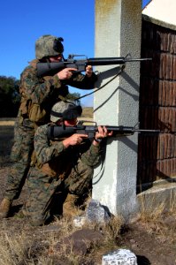 US Navy 090630-A-1839I-086 Cpl. Joseph Wiedel and Cpl. Mathew Ingle, both assigned to the 2nd Marine Expeditionary Force (2nd MEF), prepare to demonstrate running from corner to corner