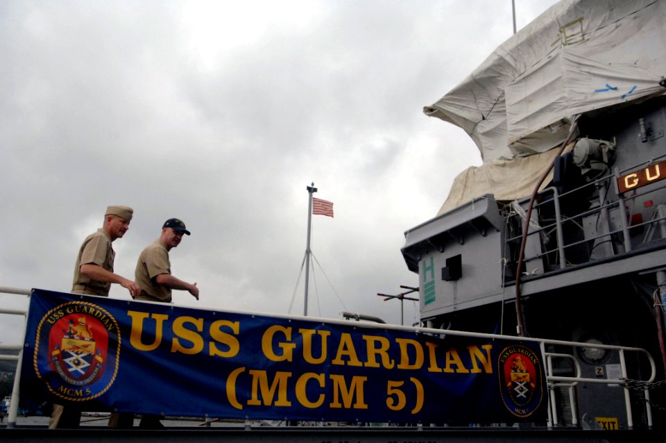 US Navy 090629-N-9818V-231 Master Chief Petty Officer of the Navy (MCPON) Rick West goes aboard the mine countermeasures ship USS Guardian (MCM-5) for a tour of the ship and to meet with the Sailors