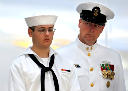 US Navy 090626-N-5328N-475 Master Chief Sonar Technician Lou Wills, Center for Information Dominance (CID) Corry Station senior enlisted leader, keeps a close eye on a Sailor who is manning the rails during the CID Corry Statio