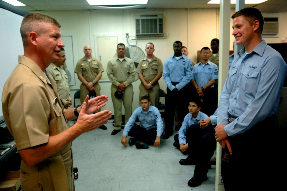 US Navy 090629-N-9818V-151 Master Chief Petty Officer of the Navy (MCPON) Rick West takes questions from Sailors assigned to the mine countermeasures ship USS Avenger (MCM-1) during his visit to U.S. Fleet Activities Sasebo