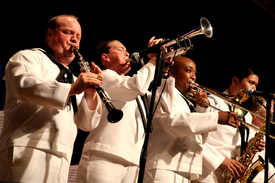 US Navy 090702-N-3271W-143 Musicians from the U.S. Navy Band Northeast Mardi Gras ensemble perform during a concert at Somerville High School