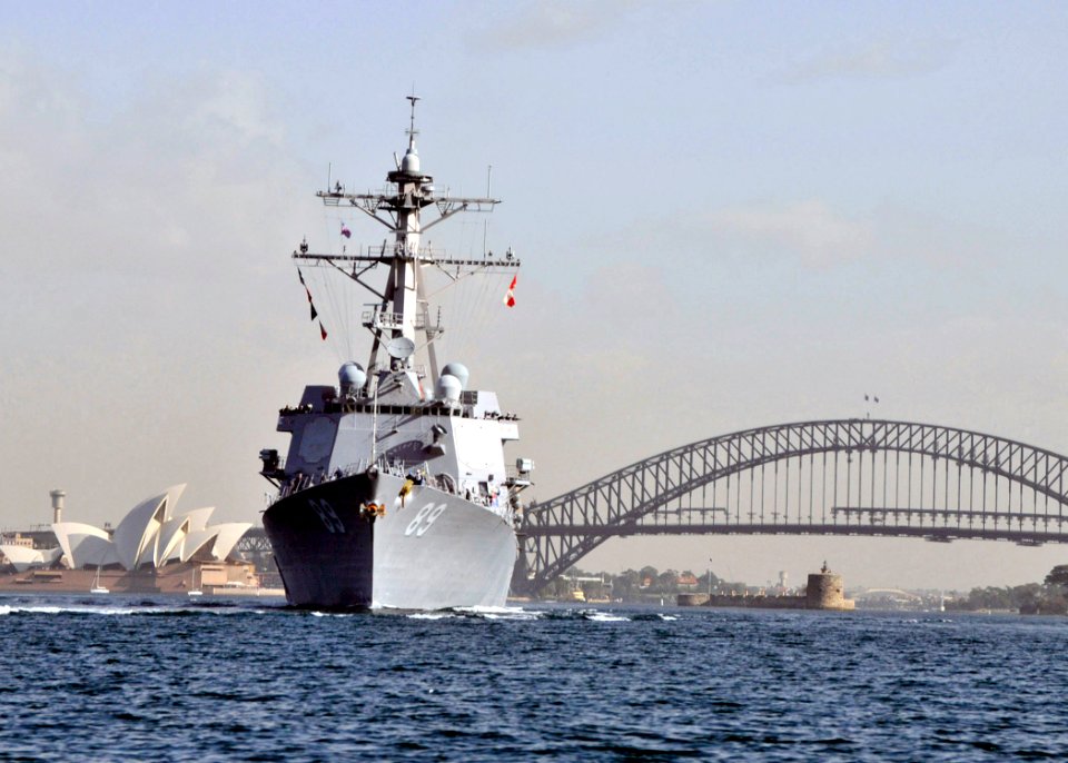 US Navy 090701-N-2638R-003 The guided-missile destroyer USS Mustin (DDG 89) transits through Sydney Harbor after completing a scheduled port visit in Sydney, Australia
