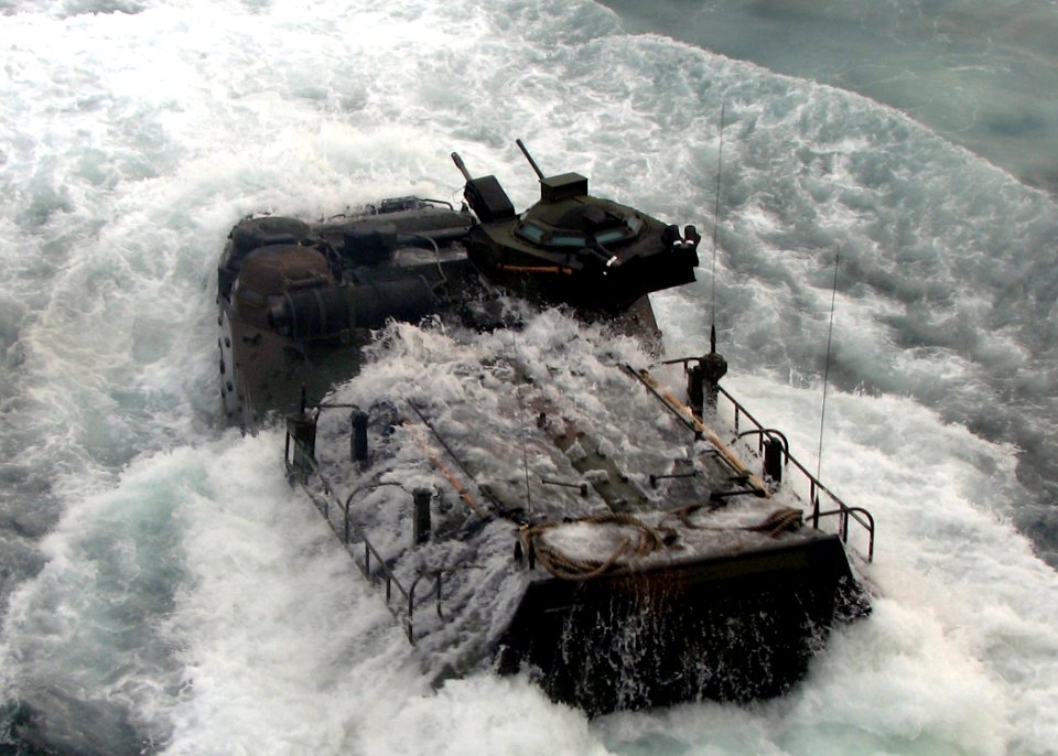 US Navy 090629-N-7058E-042 An amphibious assault vehicle transporting U.S. Marines and Malaysian Army soldiers from the 9th Royal Malay Regiment splashes into the water after launching