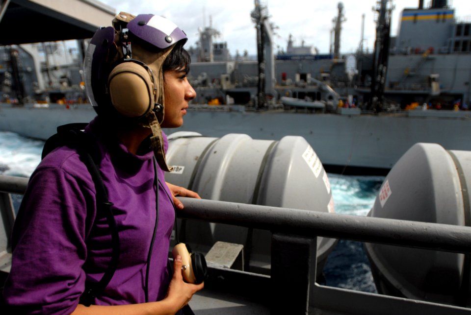 US Navy 090630-N-9132C-026 Aviation Boatswain's Mate (Fuel) Alanna Velasquez stands watch aboard the aircraft carrier USS Ronald Reagan (CVN 76) during a replenishment at sea