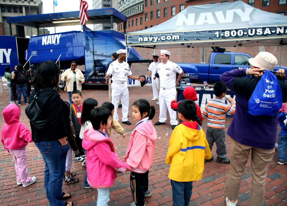 US Navy 090701-N-3271W-004 At City Hall Plaza local citizens await their turn on the Navy's F-A-18 Hornet flight simulator during Boston Navy Week