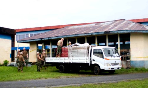 US Navy 090701-N-9689V-005 Seabees assigned to Amphibious Construction Battalion (ACB) 1 and Naval Mobile Construction Battalion (NMCB) 1 renovate a building at Apia National Hospital