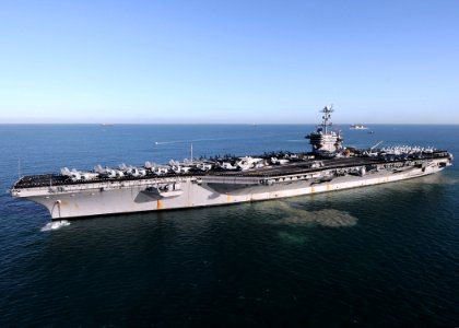 US Navy 090702-N-9565D-269 The Nimitz-class aircraft carrier USS George Washington (CVN 73) lowers her port anchor off the coast of Fremantle, Western Australia before a port visit