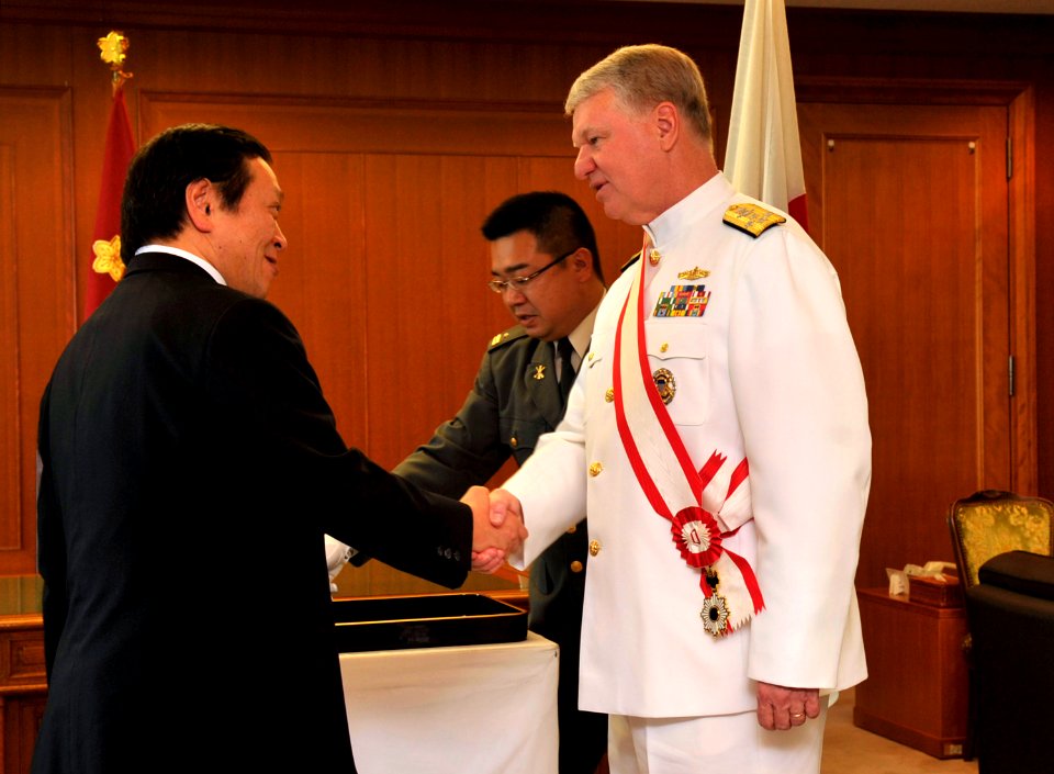 US Navy 090703-N-8273J-053 Japan Defense Minister Yasukazu Hamada, left, congratulates Chief of Naval Operations (CNO) Gary Roughead after Roughead was presented with the Grand Cordon of the Rising Sun award