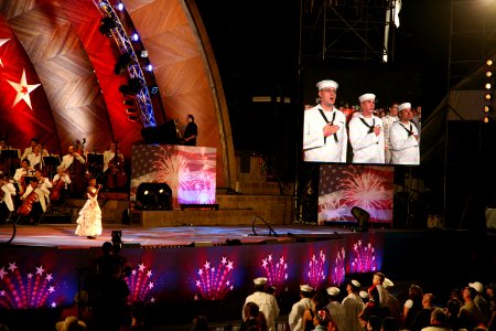 US Navy 090704-N-3271W-163 Three local sailors sing