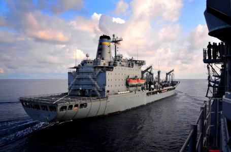 US Navy 090702-N-4774B-028 The guided-missile cruiser USS Lake Champlain (CG 57) pulls alongside the fleet replenishment oiler USNS Tippecanoe (T-AO 199) during an underway replenishment