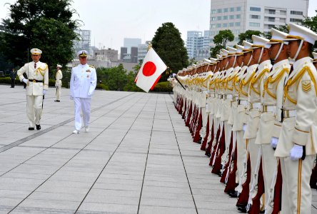 US Navy 090703-N-8273J-026 Chief of Naval Operations (CNO) Adm. Gary Roughead, middle, inspects Japan Self-Defense Force troops during an honors visit in Tokyo