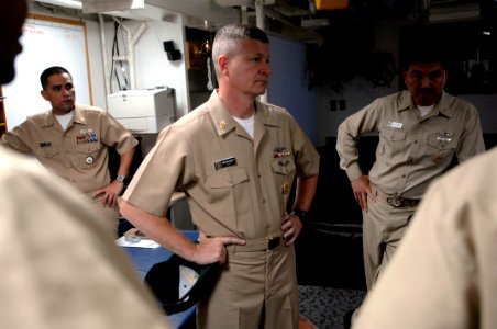 US Navy 090703-N-9818V-107 Master Chief Petty Officer of the Navy (MCPON) Rick West speaks with the chief's mess aboard the guided-missile destroyer USS Curtis Wilbur (DDG 54) photo