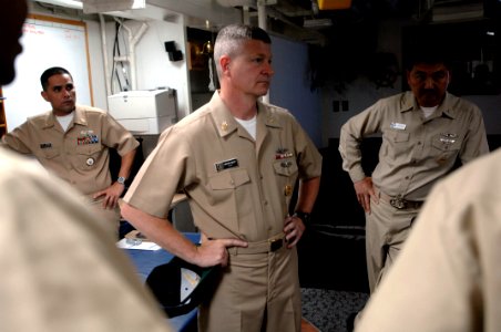 US Navy 090703-N-9818V-107 Master Chief Petty Officer of the Navy (MCPON) Rick West speaks with the chief's mess aboard the guided-missile destroyer USS Curtis Wilbur (DDG 54)