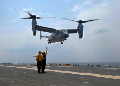 US Navy 090707-N-3592S-023 A V-22 Osprey assigned to Marine Medium Tiltrotor Squadron 162 based in New River, N.C. comes in for a landing aboard the amphibious assault ship USS Nassau (LHA 4)