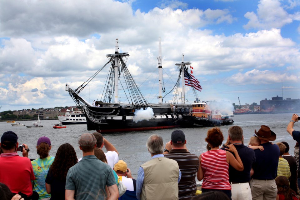 US Navy 090704-N-8110K-080 Spectators at the U.S. Coast Guard Station in Boston watch as USS Constitution,
