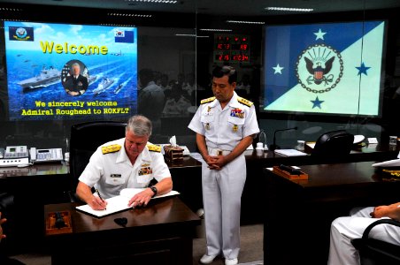 US Navy 090707-N-8273J-170 Chief of Naval Operations (CNO) Adm. Gary Roughead meets with Vice Adm. ParkJung-hwa, Commander, Republic of Korea Fleet while visiting theRepublic of Korea Fleet headquarters in Busan, Korea photo
