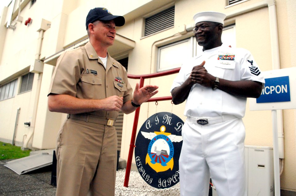 US Navy 090707-N-9818V-031 Master Chief Petty Officer of the Navy (MCPON) Rick West speaks with a Sailor assigned to the Aircraft Intermediate Maintenance Department at Naval Air Facility Atsugi, Japan during his visit to the b