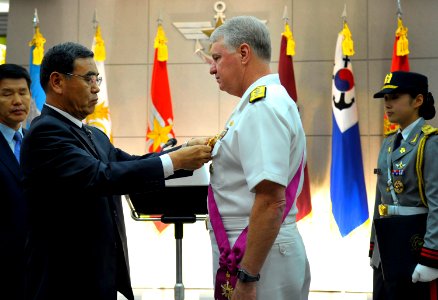 US Navy 090706-N-8273J-132 Chief of Naval Operations (CNO) Adm. Gary Roughead receives the National Security Merit Tongil Medal for his outstanding and meritorious service rendered to the Republic of Korea