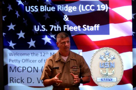 US Navy 090706-N-9818V-182 Master Chief Petty Officer of the Navy (MCPON) Rick West speaks with the crew of the amphibious command ship USS Blue Ridge (LCC 19) photo