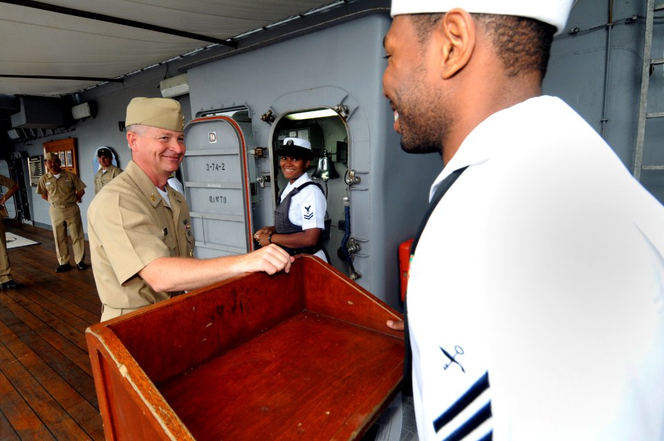 US Navy 090706-N-3830J-009 Master Chief Petty Officer of the Navy (MCPON) Rick West speaks with the Messenger of the Watch during his visit aboard the amphibious command ship USS Blue Ridge (LCC 19)