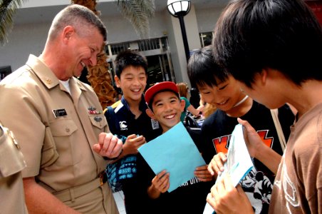 US Navy 090707-N-9818V-365 Master Chief Petty Officer of the Navy (MCPON) Rick West meets and talks with Japanese sixth grade elementary school students at Naval Air Facility Atsugi, Japan during his visit to the base
