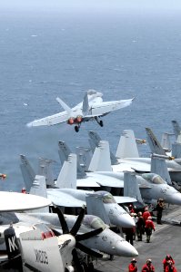 US Navy 090707-N-3610L-087 An F-A-18F Super Hornet, assigned to the Fighting Redcocks from Strike Fighter Squadron (VFA) 22, launches off the flight deck of the aircraft carrier USS Ronald Reagan (CVN 76)