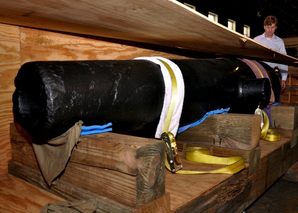 US Navy 090706-N-9671T-019 A 32-lb cannon recovered from the wreck of the Confederate sloop-of-war CSS Alabama is seen at the Naval History and Heritage Command laboratory warehouse