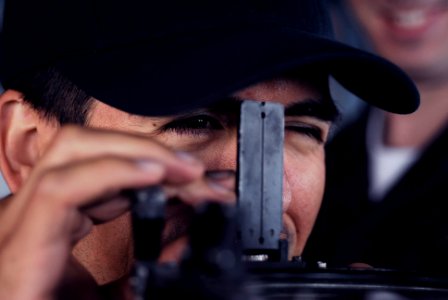 US Navy 090707-N-7092S-145 Ens. John Guzman uses an azimuth circle aboard the guided-missile frigate USS Kauffman (FFG 59) during leapfrog exercises with the Royal Navy destroyer HMS Manchester (D 95), not pictured, off the coa