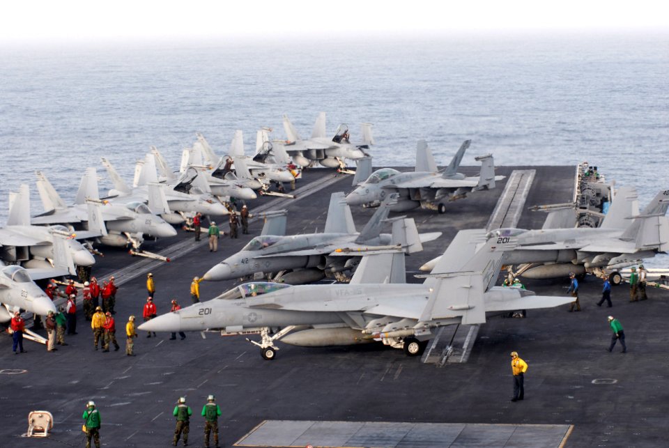 US Navy 090706-N-9132C-002 Hornets and Super Hornets are secured on the flight deck as they are repositioned in preparation to launch from the aircraft carrier USS Ronald Reagan (CVN 76)