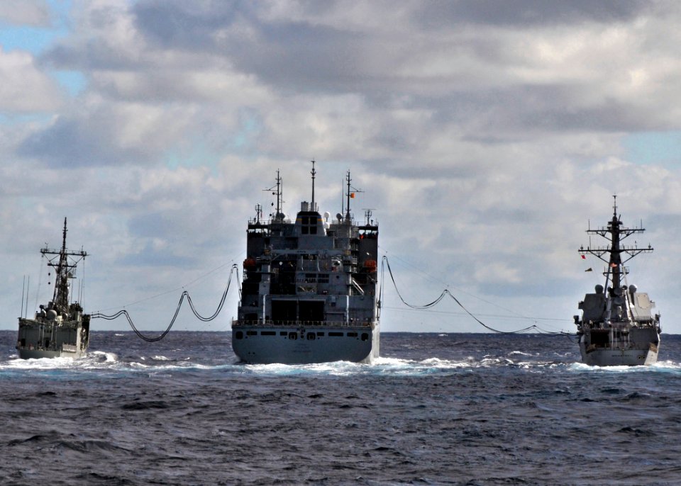 US Navy 090708-N-2638R-001 The Arleigh Burke-class guided-missile destroyer USS McCampbell (DDG 85), right, and the Royal Australian Navy Adelaide-class guided-missile frigate HMAS Newcastle (FFG 06) take on fuel