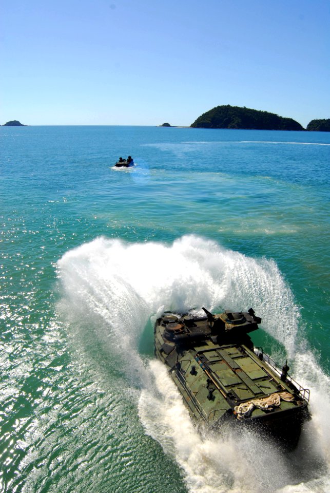 US Navy 090707-N-5538K-233 Amphibious Assault vehicles exit the well deck of the forward deployed amphibious transport dock ship USS Denver (LPD 9) during a Talisman Saber 2009 training exercise