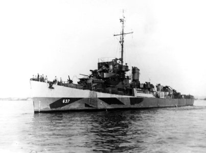 USS Bowers (DE-637) arriving in the Kerama Islands after being hit by a Kamikaze, 16 April 1945 (80-G-315257)