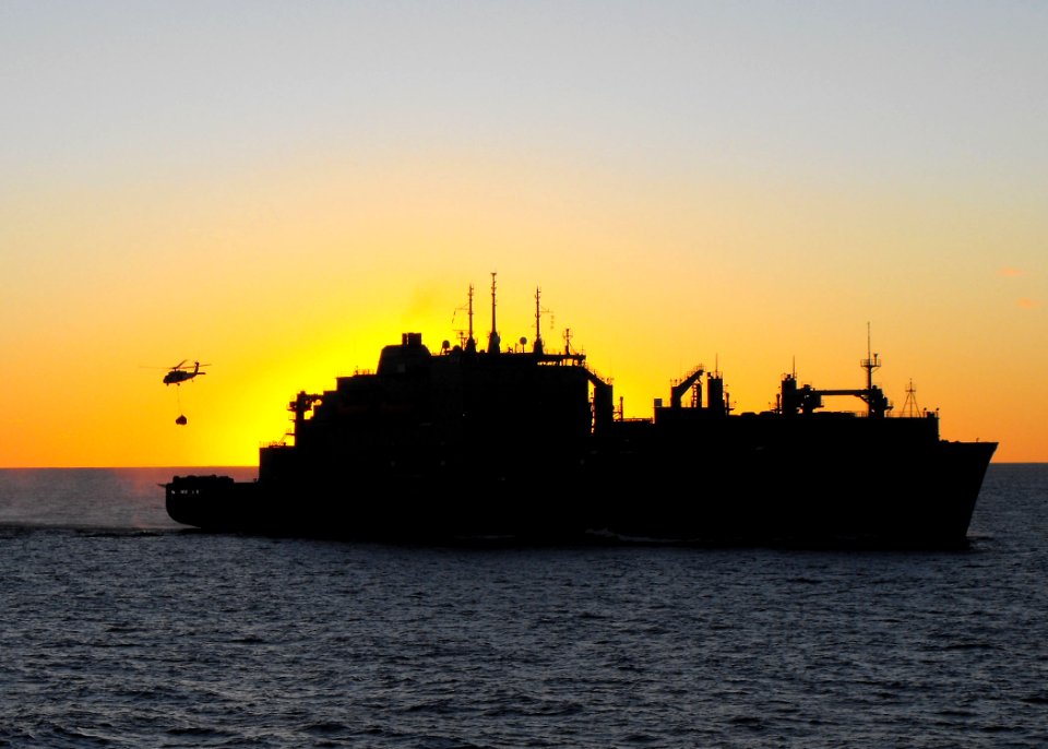 US Navy 090711-N-2406S-002 An MH-60S Sea Hawk helicopter assigned to the Island Knights of Helicopter Combat Squadron (HSC) 25, transfers stores from the Military Sealift Command dry cargo-ammunition ship USNS Alan Shepard (T-A