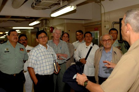 US Navy 090708-F-1333S-114 Capt. Tom Negua, mission commander for Continuing Promise 2009, addresses a group of distinguished visitors aboard the Military Sealift Command hospital ship USNS Comfort (T-AH 20). Comfort (T-Ah 20)