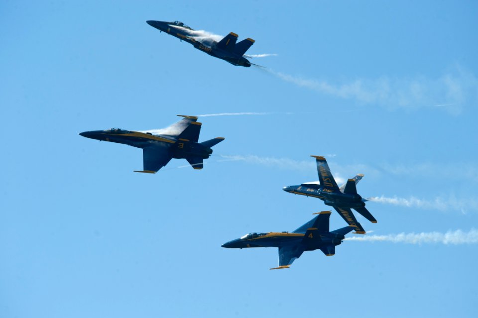 US Navy 100918-N-0092J-215 F-A-18 Hornets assigned to the U.S. Navy flight demonstration squadron, the Blue Angels, fly over Naval Air Station Ocea