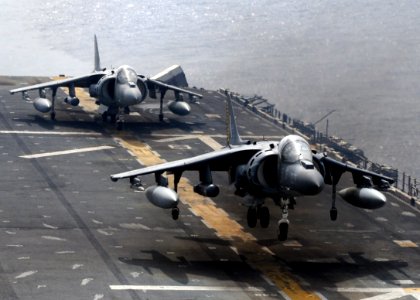US Navy 100917-N-5538K-077 An AV-8B Harrier jet aircraft assigned to Marine Attack Squadron (VMA) 542 prepares to land aboard the forward-deployed